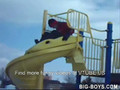 Stupid fool falls off kids slide OUCH