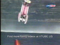 Powerboat flips over in the air