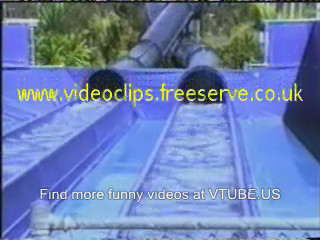 Guy comes flying out of water shoot  flumes sideways