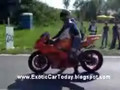 Two bikers crash on races