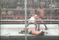 Rikishi vs Triple H vs Kurt Angle vs The Rock vs The Undertaker vs Steve Austin (Hell In A Cell Match).mpg