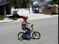 Noah riding bicycle