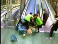 Madrid Woman Falls Down Escalator