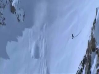 Extreme Ski down a cliff - Crazy Guy!