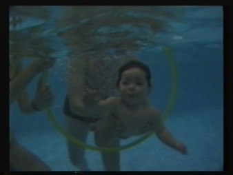 Babies dive through a ring