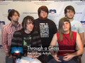 Members of Through A Glass tell how the loss of bandmate.