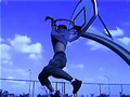 Joseph Huntley goes into a basketball hoop