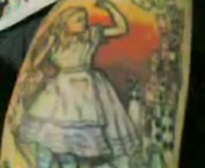 sharon's alice in wonderland tatoo